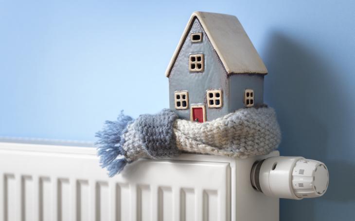 Plastic house on a radiator 